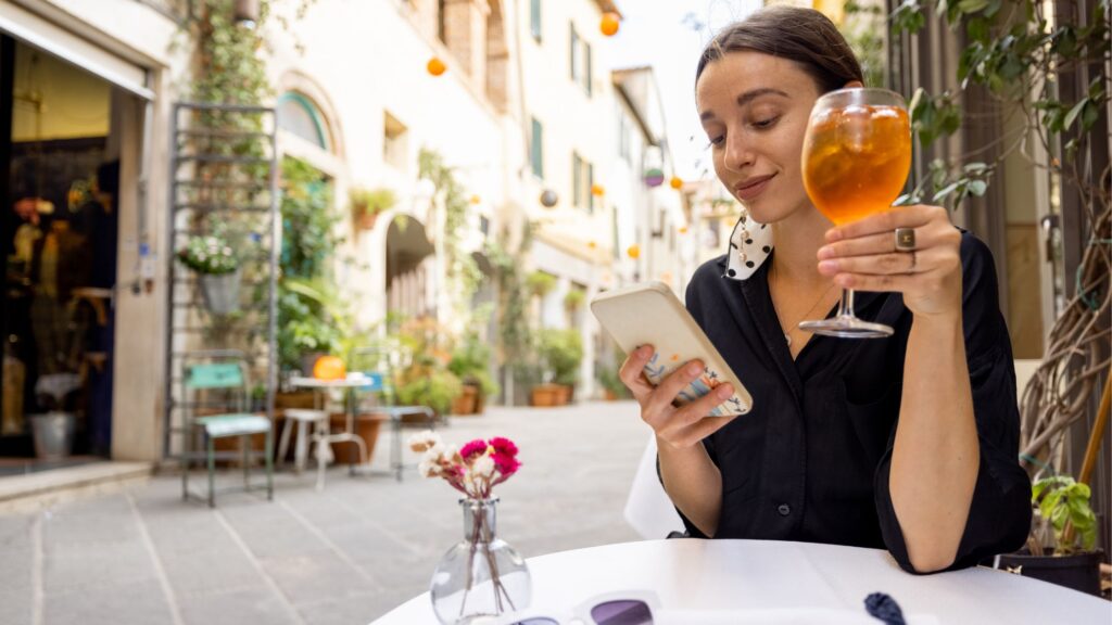 Confident woman enjoying coffee break while balancing work and life